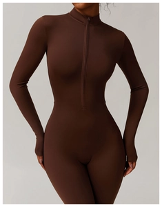 Close-up of deep coffee yoga bodysuit with thumbholes and front zipper detail