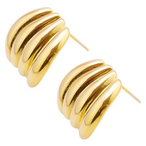 Macro detail of chunky gold croissant earrings made of polished 304 stainless steel