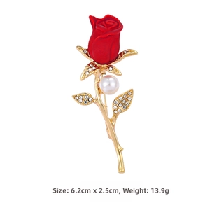 Detail of red rose brooch with gold stem, pearl accent and clear crystals, 6.2cm size