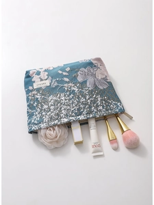 Floral jacquard large makeup bag with blue gold silk pattern and metal zipper closure