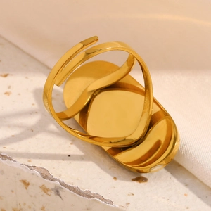 Close-up of adjustable 18K gold plated stainless steel ring with oval bezel setting