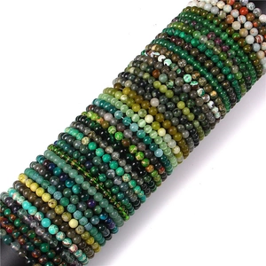 Close-up of 6mm natural stone bead bracelets with marbled textures and diverse colors