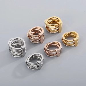Multi-layer wrap rings in gold silver and rose gold with sparkling diamond accents