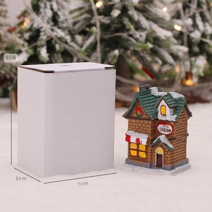 Illuminated Christmas ice cream house miniature resin ornament with snowy roof and gift box