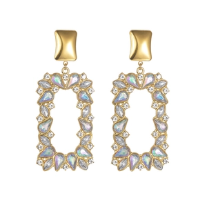 Golden square drop earrings with sparkling rhinestones for women on white background