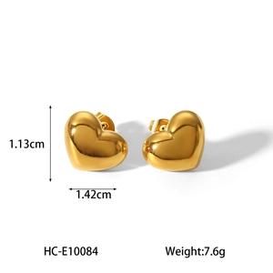 Detailed view of gold heart stud earrings with size and weight measurements