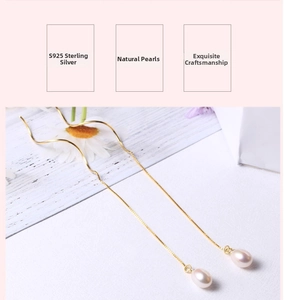 Detail view of long S925 sterling silver ear threads with elegant natural pearls