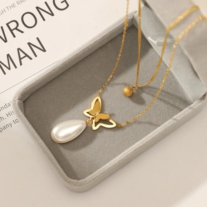 Double-layer 14K gold plated necklace featuring a hollow butterfly and pearl pendant