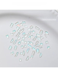 Mix of 50 aurora moonlight flatback mini crystals in various 3D nail art shapes