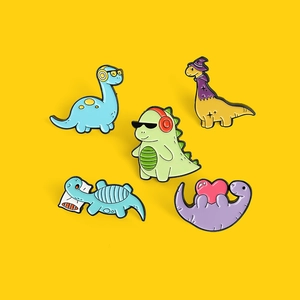 5-piece cartoon dinosaur enamel pin set featuring colorful designs with headphones