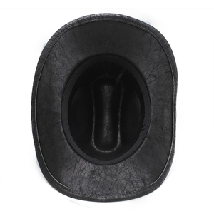 Close-up of black western cowboy hat showing vintage distressed leather texture and sweatband