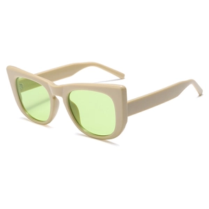 Retro cream cat-eye sunglasses with light green lenses and thick square frames