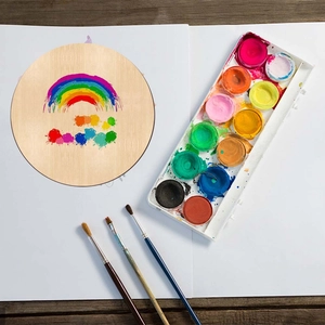 DIY round wood slice with colorful rainbow painting and watercolor art supplies