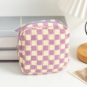 Knitted checkerboard cosmetic bag in purple and beige with a durable metal zipper