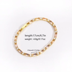 Dettaglio del bracciale tennis dorato da 17 cm con pietre champagne e specifiche di misura
