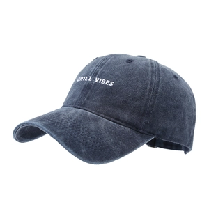 Retro navy washed cotton baseball cap featuring white Chill Vibes embroidery on the front