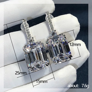 Elegant emerald cut zircon drop earrings in silver finish for business events
