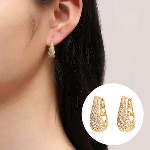 Elegant gold U-shaped drop earrings for women with white zircon and heart hollow detail