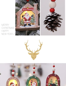 Close-up of LED wooden Christmas ornaments featuring Santa, reindeer and pine cones