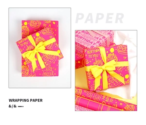 Detail of neon pink birthday wrapping paper with hand-drawn cake pattern and text