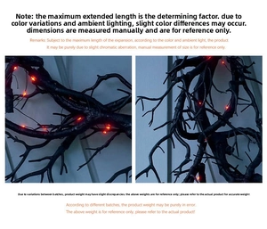 Detail of black artificial branches with red LED lights for Halloween decoration