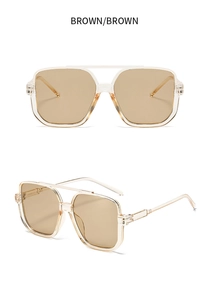 Detail der quadratischen Doppelsteg-Brille in transparentem Champagner und Braun