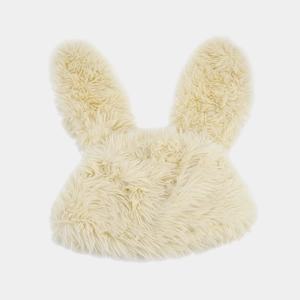 Detail of soft cream plush rabbit ears hat featuring fluffy faux fur texture