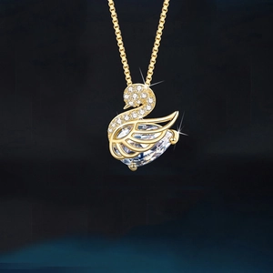 Elegant gold swan necklace pendant with sparkling crystals and pear-shaped center stone