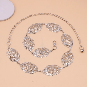 Detail of silver leaf metal waist chain with lobster clasp and adjustable extension chain