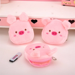 Three cute pink plush pig coin purses with soft fur and embroidered facial details