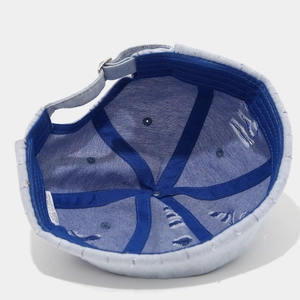 Light blue denim docker cap made of 100% cotton with adjustable strap and inner lining