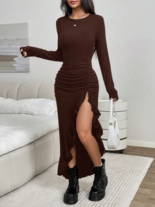 Detail of coffee brown ruched dress with asymmetrical ruffle hem and vertical textures