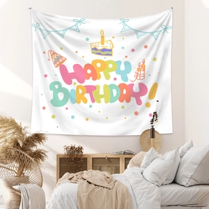 Detail showing high-quality polyester birthday tapestry with cake and colorful party patterns