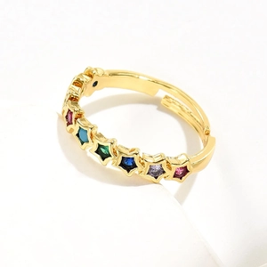 18K gold plated star ring featuring colorful rainbow zircon stones on white display