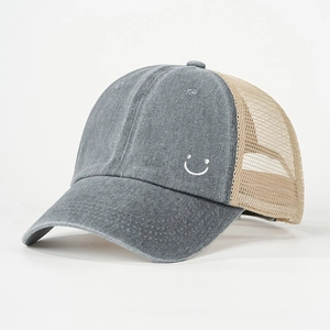 Vintage gray washed canvas baseball cap with embroidered smile face and beige mesh back