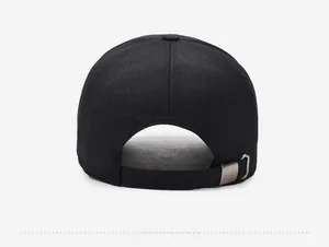 Detail view of the black baseball cap back with adjustable fabric strap and metal buckle