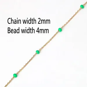 Detail of 2mm gold chain with 4mm green beads for DIY jewelry making and necklaces