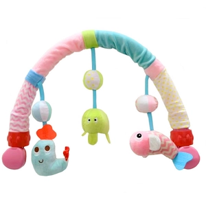 Detail of baby stroller arch with plush sea animal toys and adjustable clips for bed use