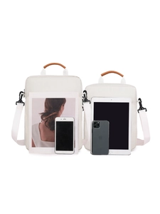 Vertical oxford fabric laptop bag size comparison in beige with tablet and magazine fits