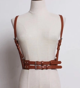 Brown leather body harness with adjustable shoulder straps and double buckle waist design