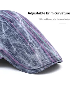Macro detail of foldable widened brim on a vintage striped cotton blend beret hat