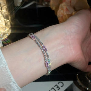 Detailed view of luxury double-layer zircon bracelet with pink marquise-cut stones