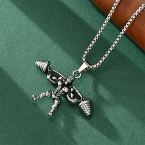 Close-up of a silver weightlifter pendant with barbell on a sleek box chain