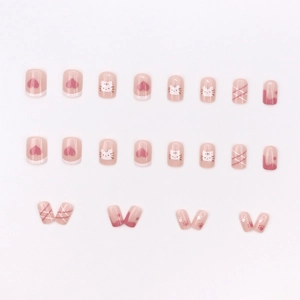 Pink press-on nails set with cute white cat faces, hearts and paw prints patterns