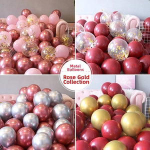 Detail of rose gold and silver metallic balloons with confetti for party decor