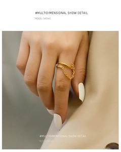 Detail view of 18K gold-plated double-layer ring with thin chain link on model hand