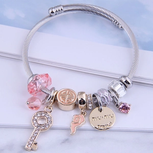 Bohemian silver wire bracelet with pink crystals, heart key and enamel cloud charms