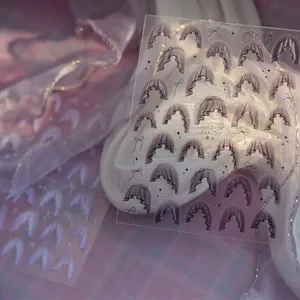 Japanese style purple lace skirt nail stickers with black bows and stars for DIY manicures