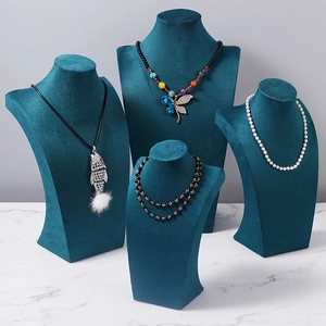 Peacock blue velvet necklace bust displays in four tiered sizes for jewelry counter display