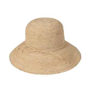 Handmade raffia straw hat with bow tie decoration and flat brim for summer beach sun protection